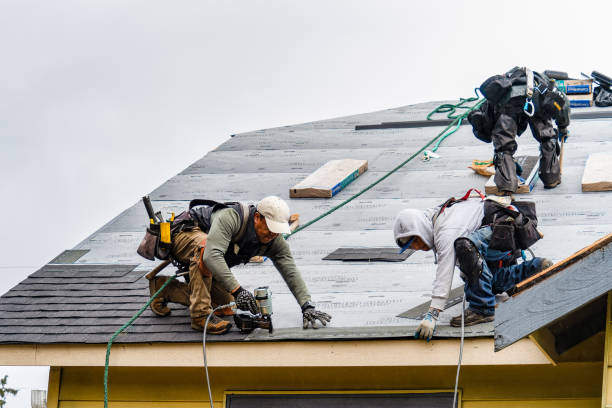 Professional Gutter Installation technician working in Paxico, KS